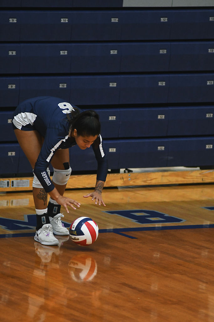 Luisa Ferreira prepares to serve on Friday